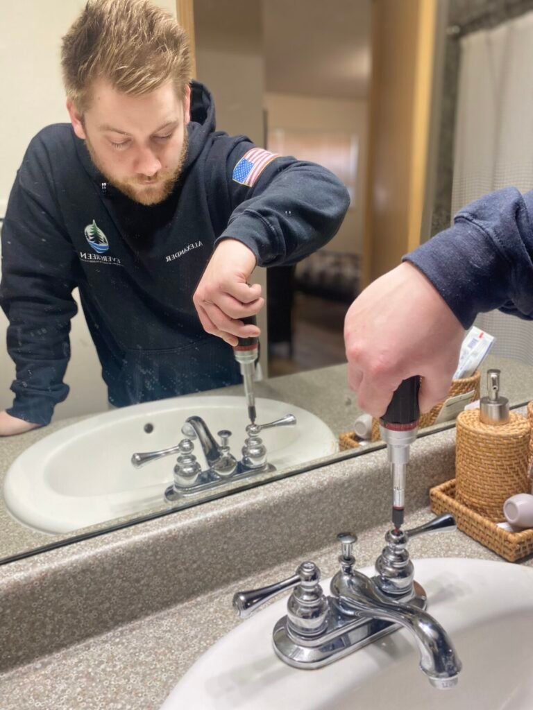 Puyallup plumber fixing sink leak | Evergreen Plumbing Authority