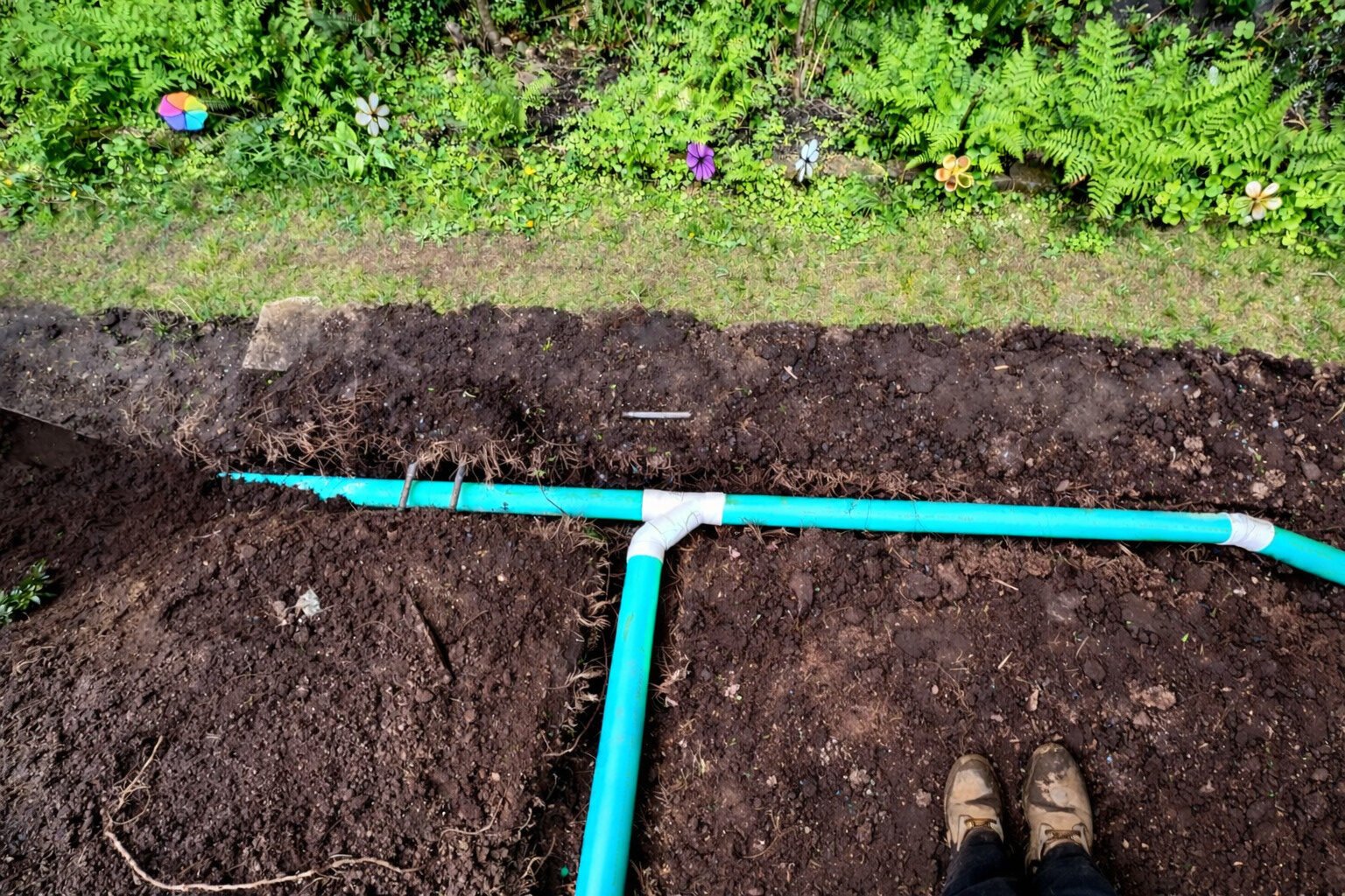 Underground sewer line repair with new PVC piping